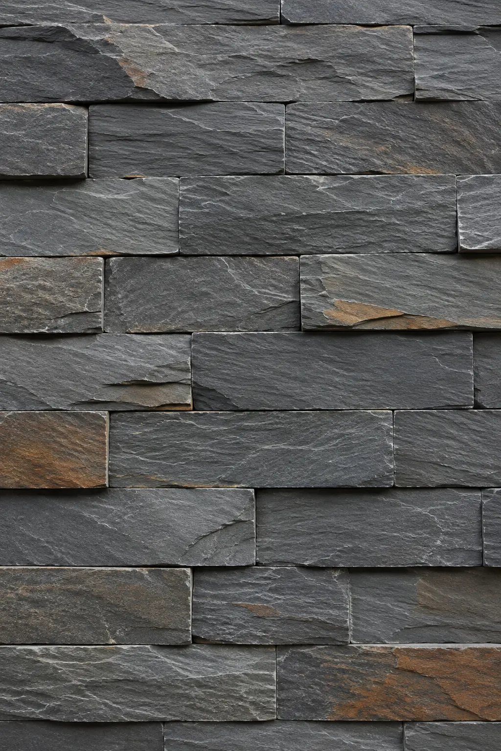 Natural slate stone wall cladding in layered grey tones