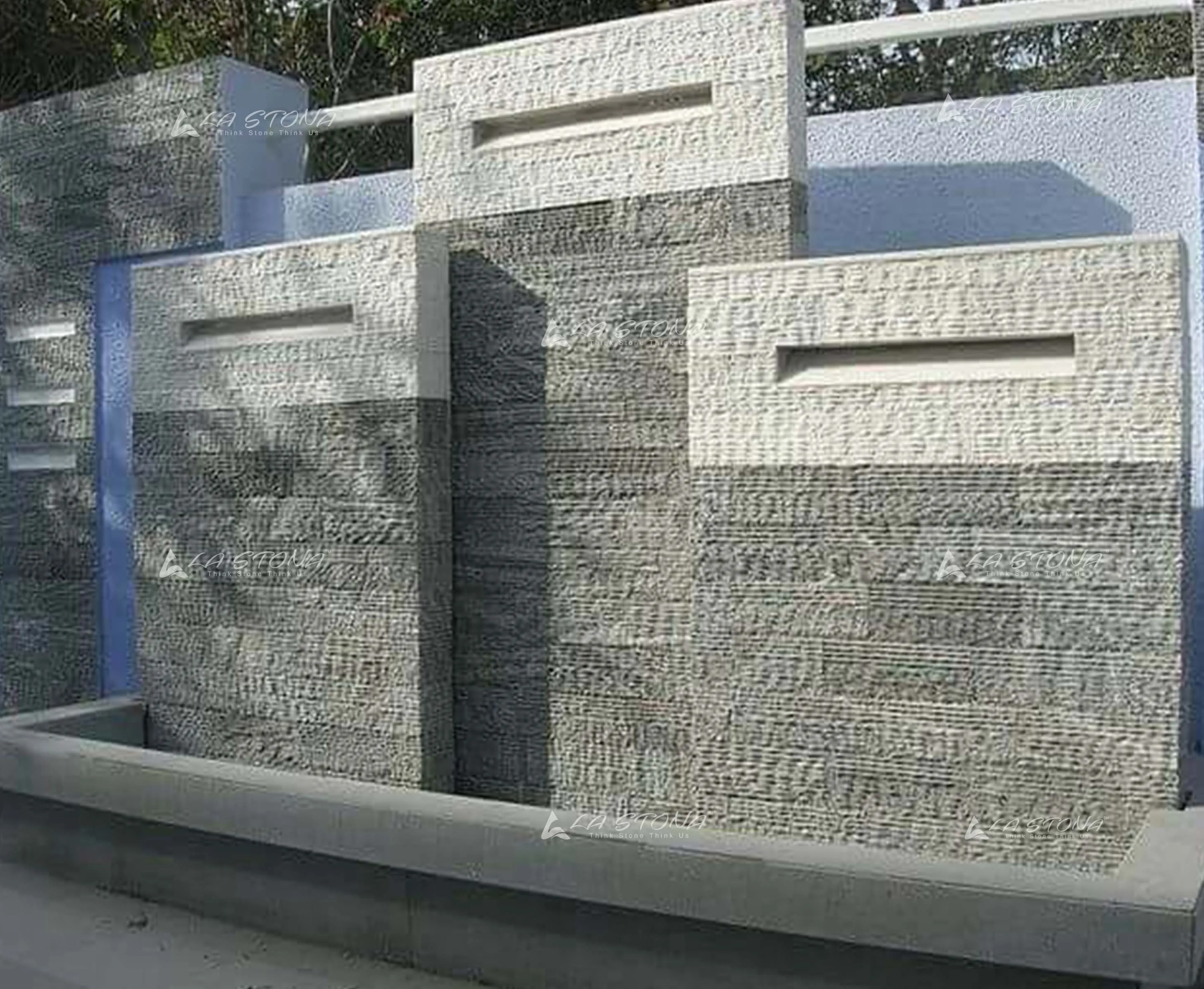 BLACK 01 natural stone cladding with smoky grey horizontal grooved texture