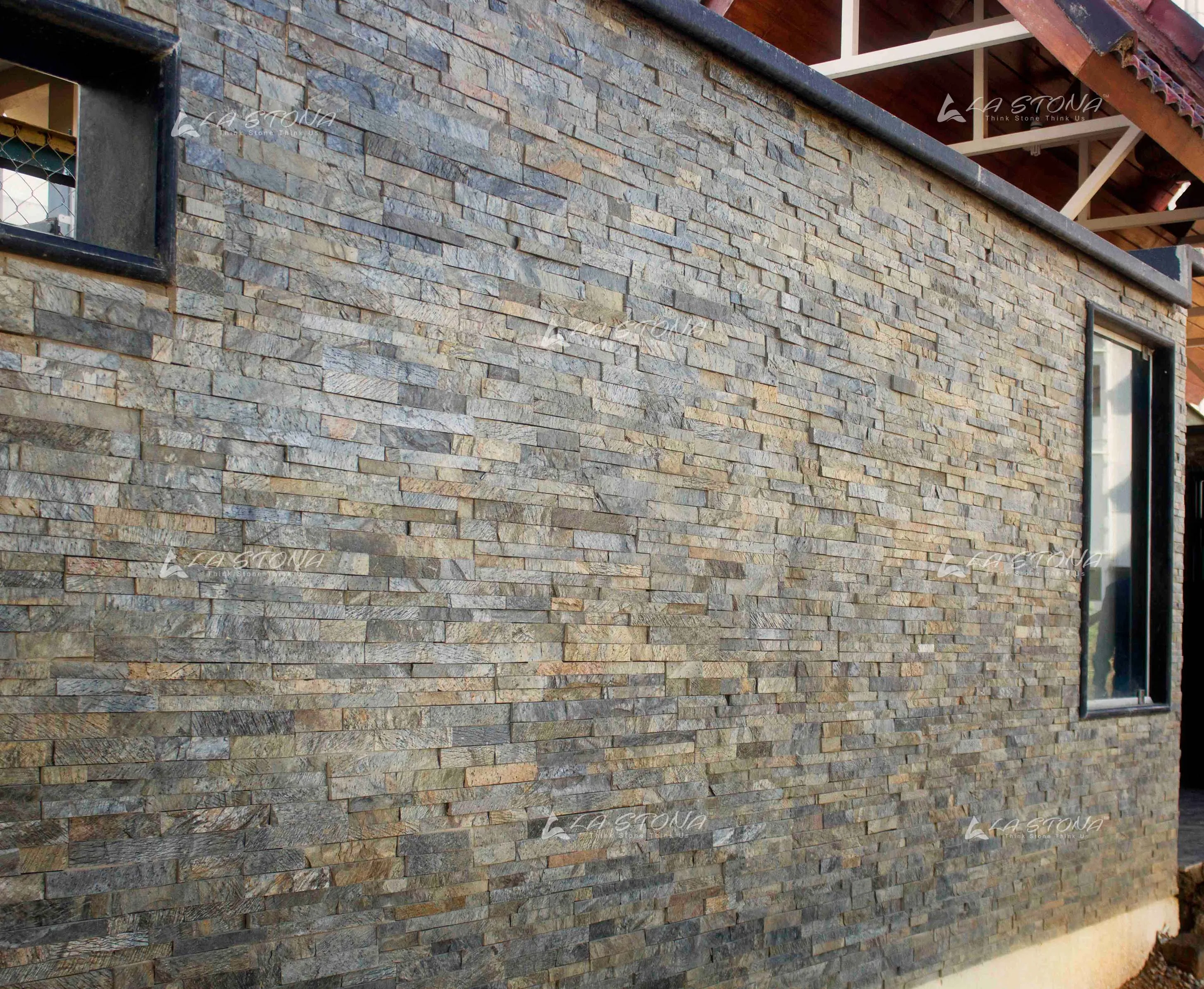 SEA CLIFF stacked natural stone cladding with olive grey earthy tones