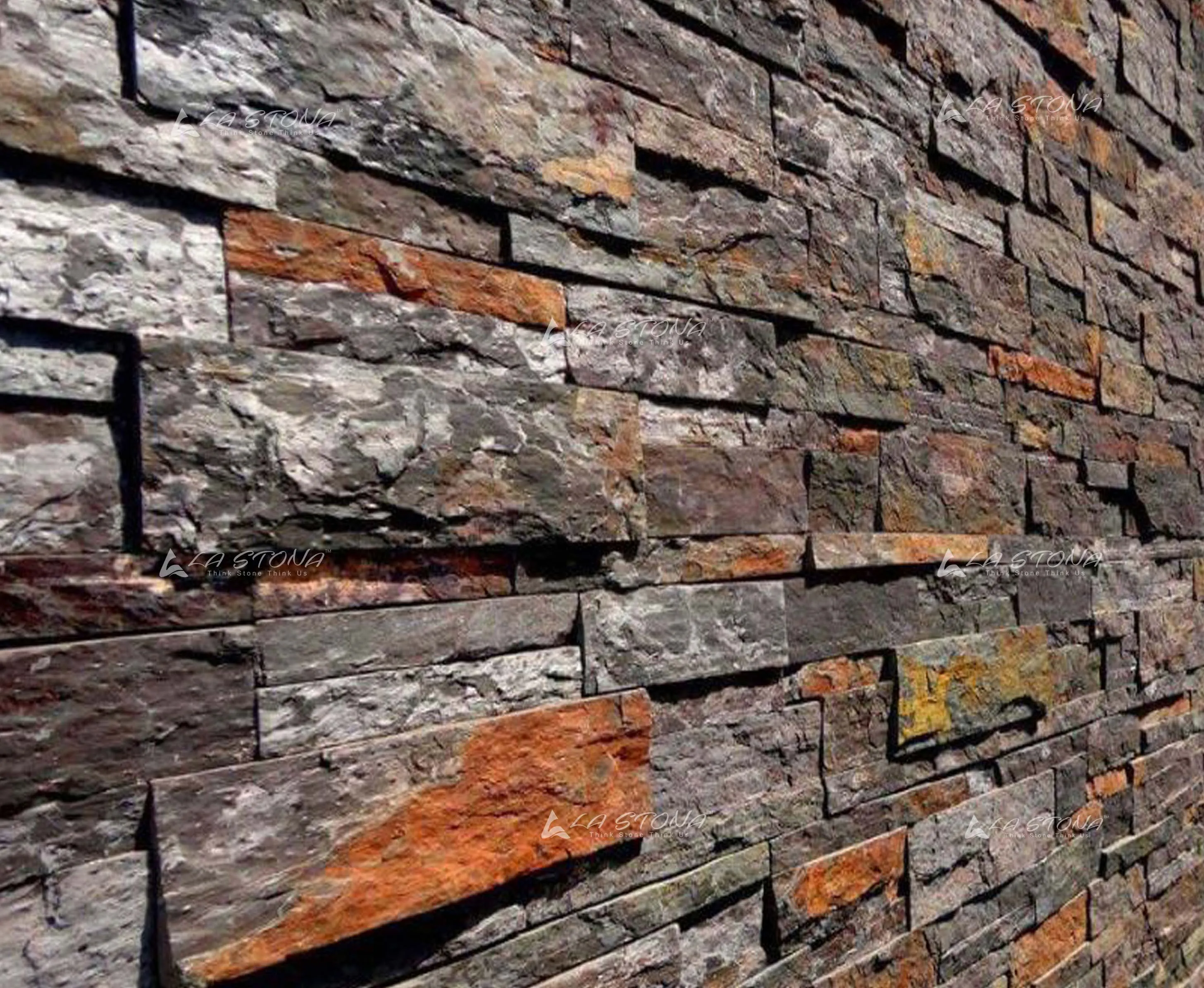 DARK LAVANZIA natural stacked stone cladding with slate grey tones and subtle copper highlights