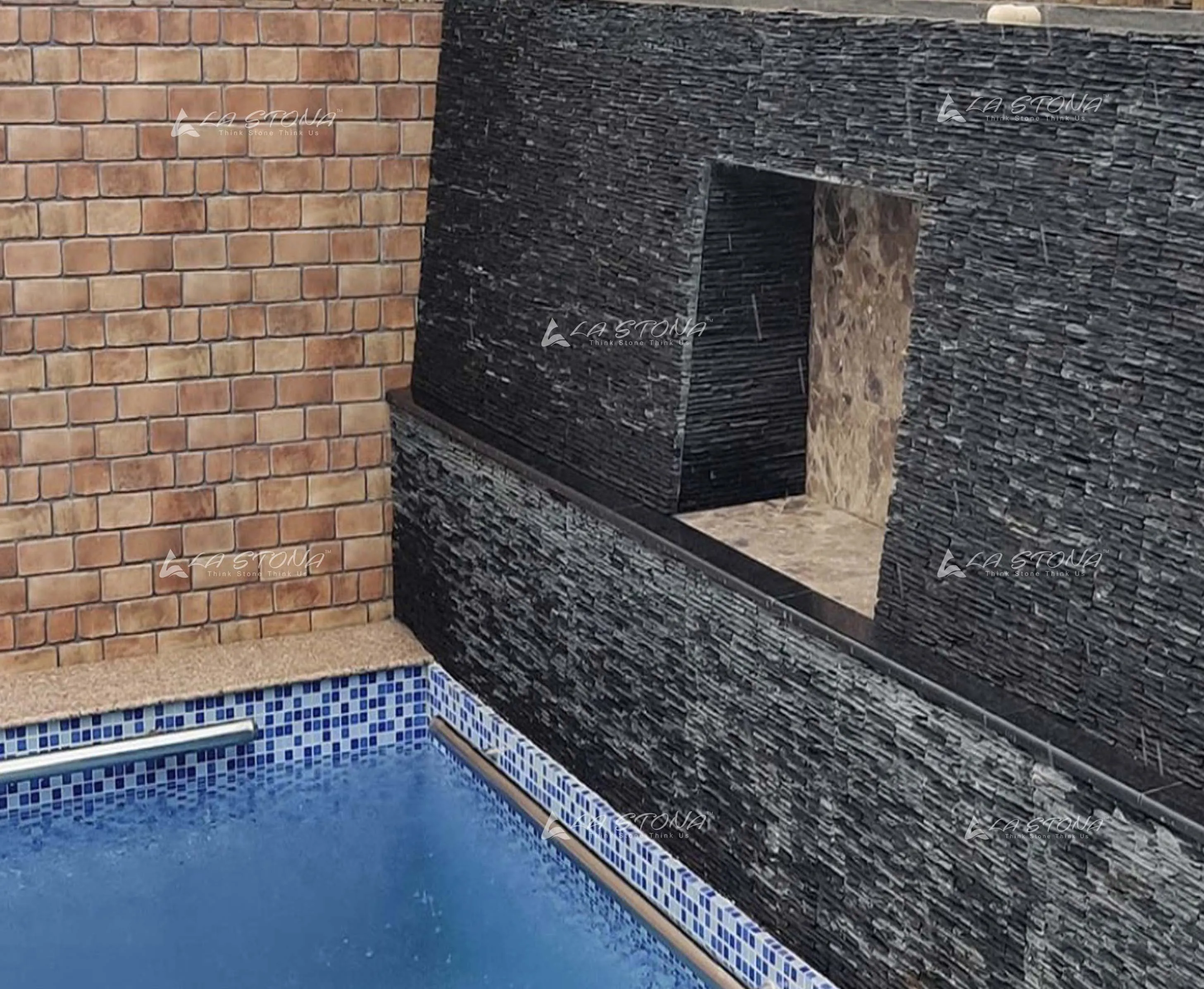 BLACK WATERFALLS dry stacked natural stone cladding with charcoal black and slate grey tones