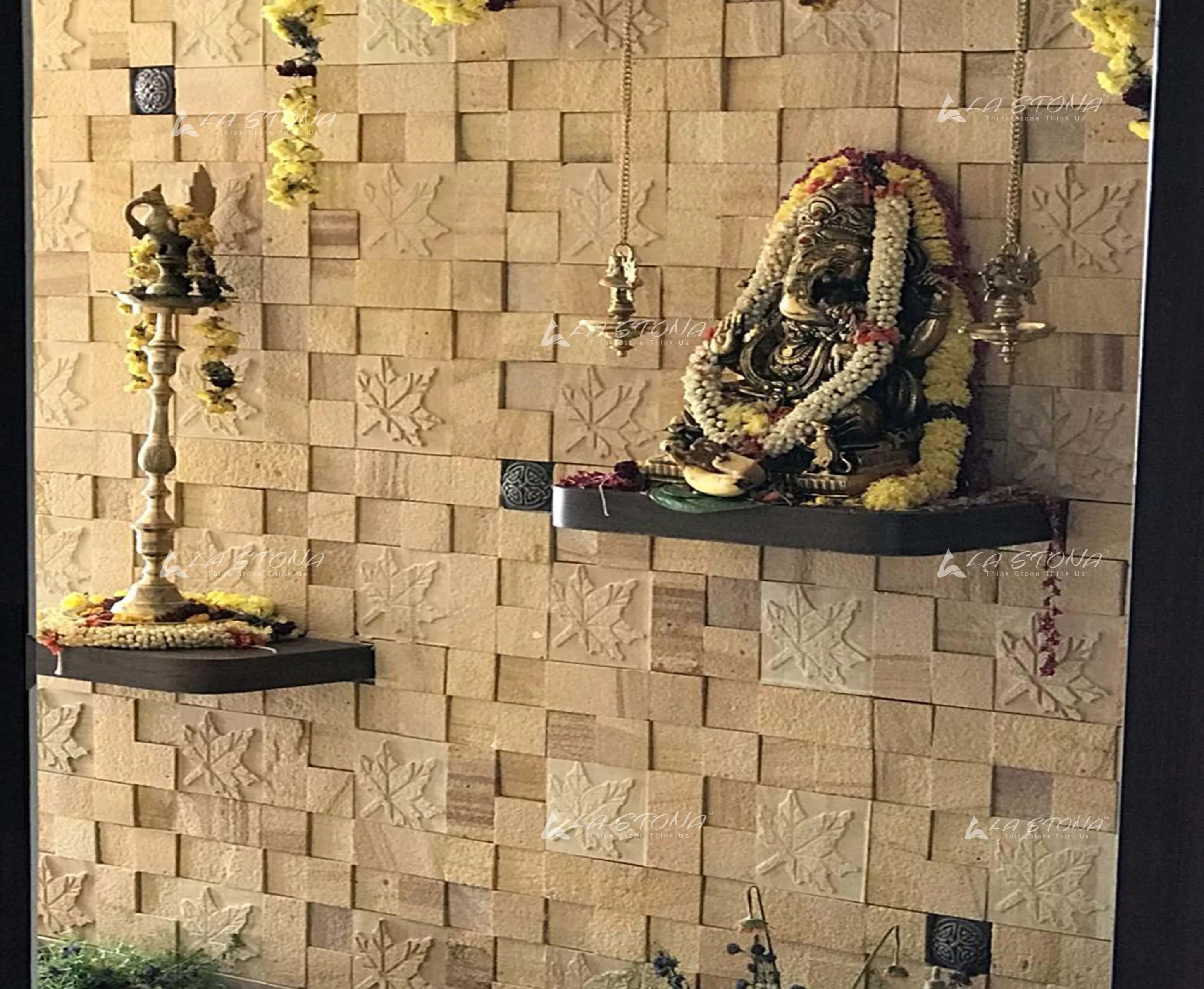 MAPLE exclusive decorative stone panel with engraved maple leaf motifs in warm golden sandstone tones
