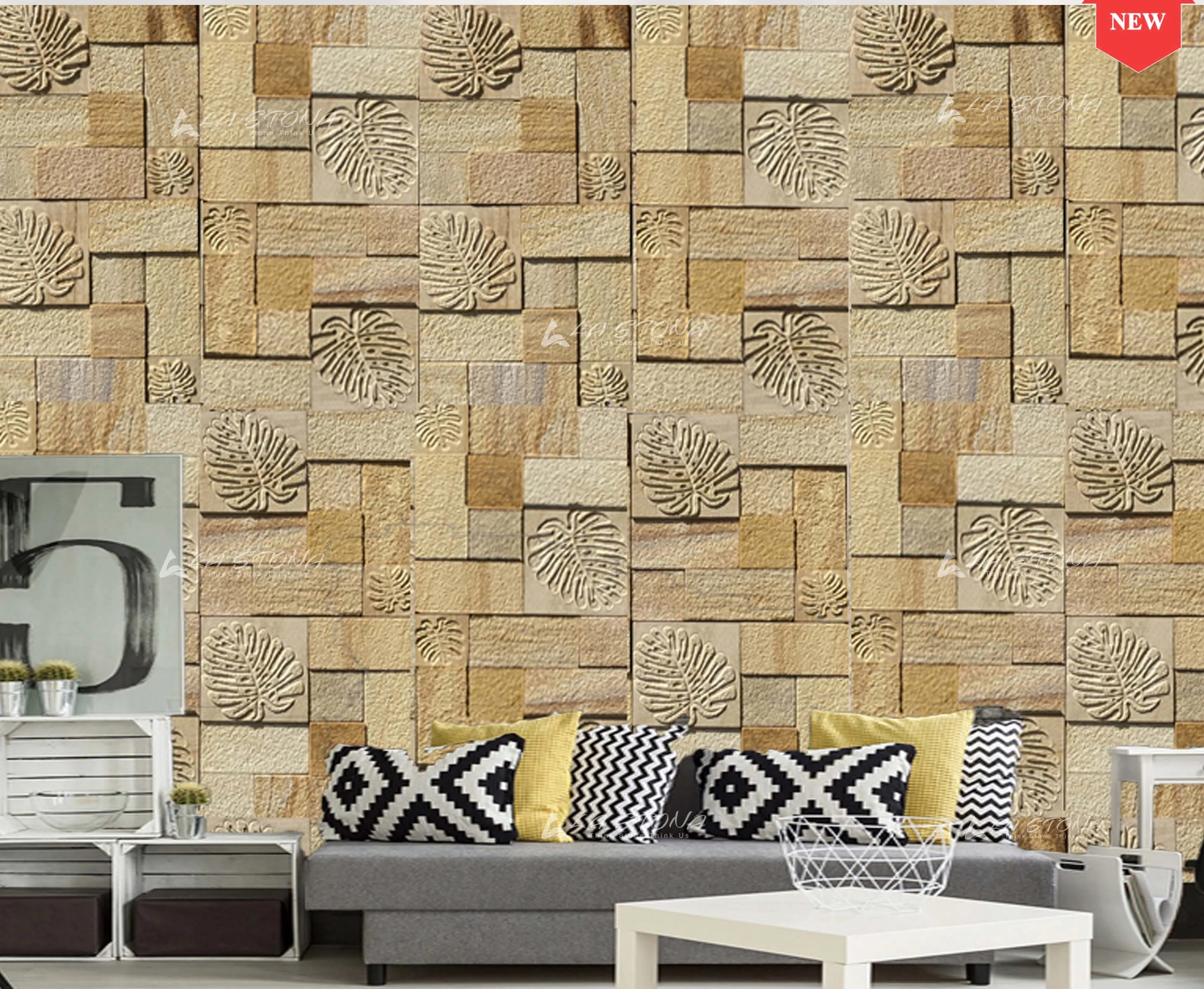 PALM LEAF exclusive decorative sandstone wall panel with engraved tropical palm leaf motifs in warm golden sandstone tones