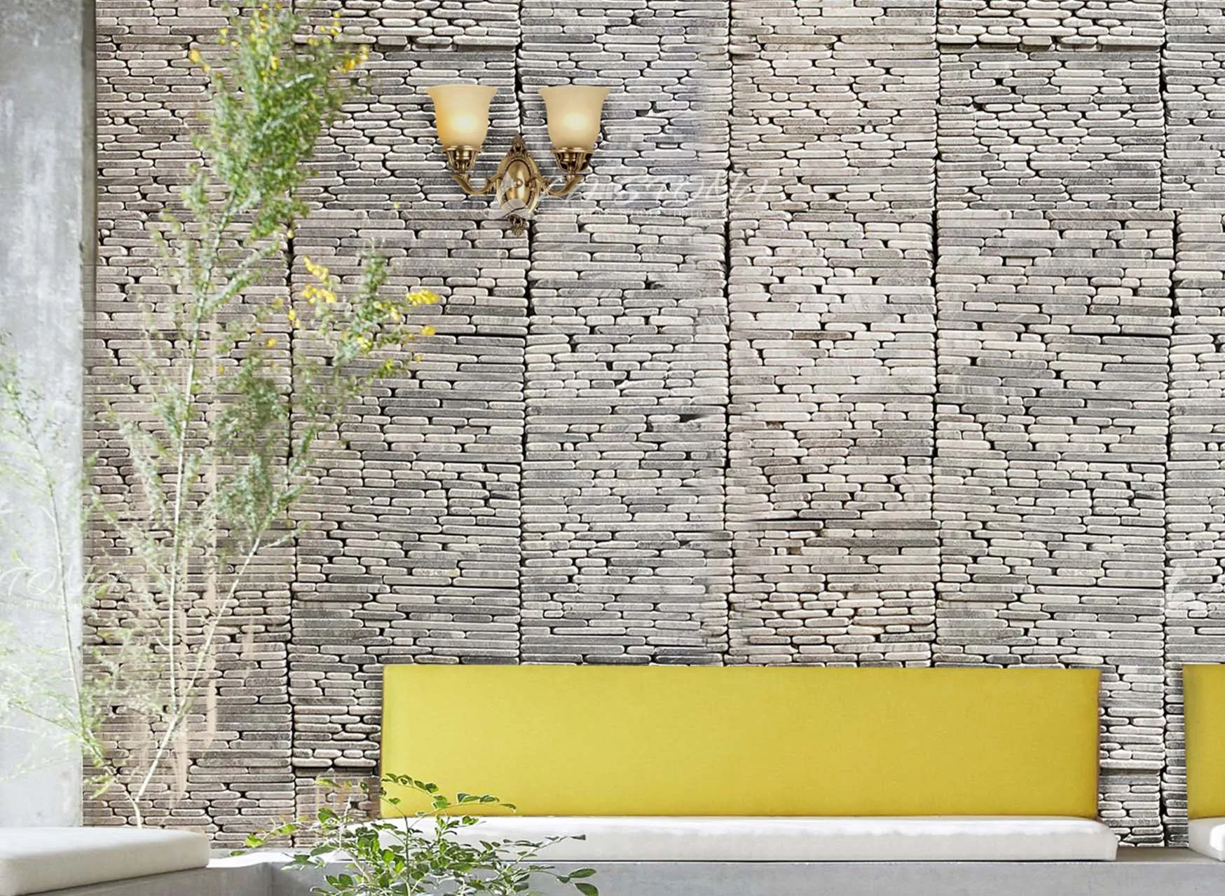 PEBBLE BAY natural stone cladding with rounded pebble stacked stone in silver grey tones