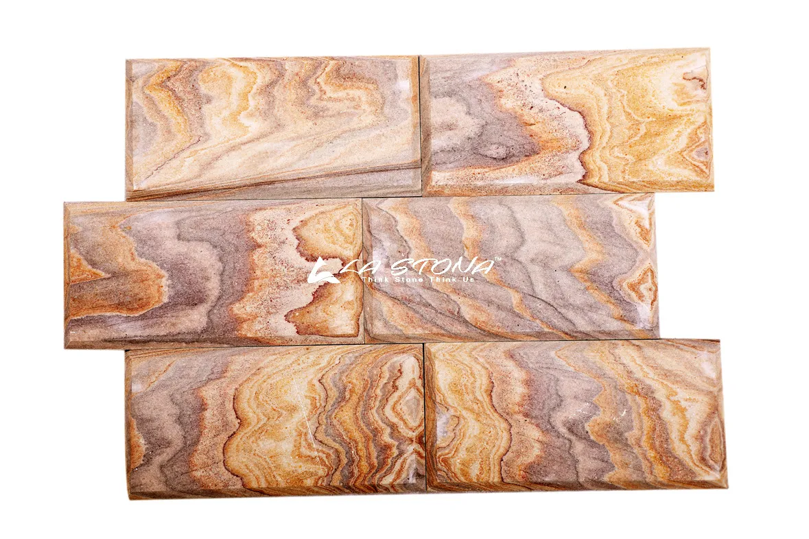 RAINBOW 01 natural stone cladding with flowing golden and earthy natural veining