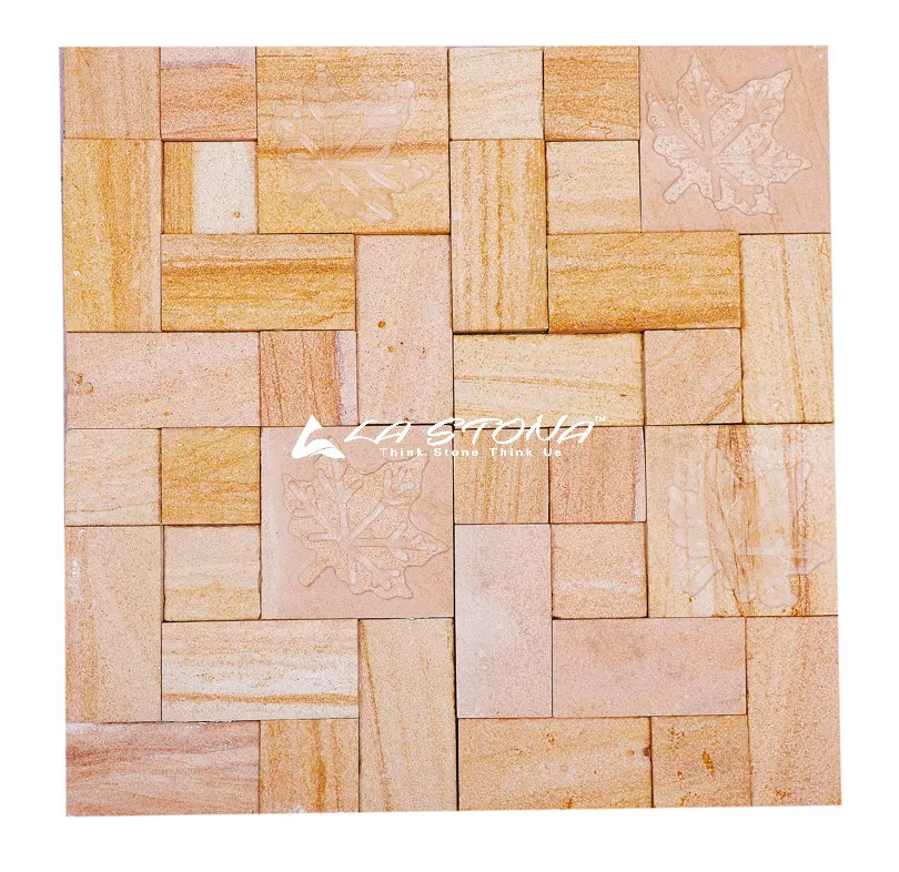 MAPLE exclusive decorative stone panel with engraved maple leaf motifs in warm golden sandstone tones