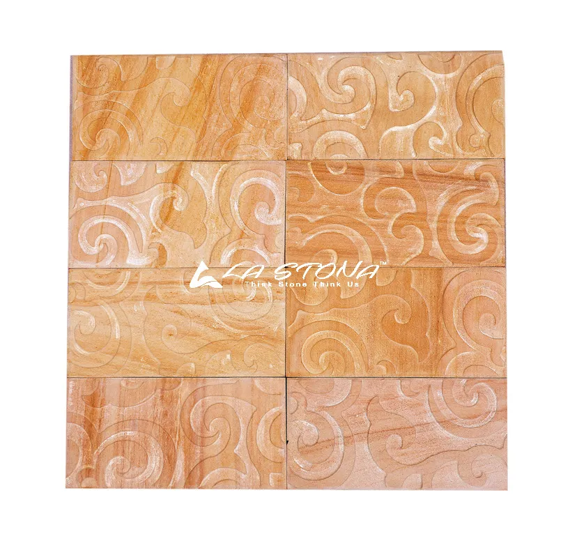 ISLAND OAK natural stone cladding with engraved spiral motifs in warm oak gold sandstone