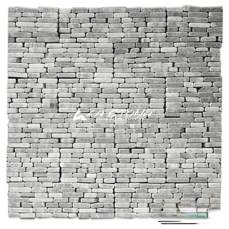 PEBBLE BAY natural stone cladding with rounded pebble stacked stone in silver grey tones